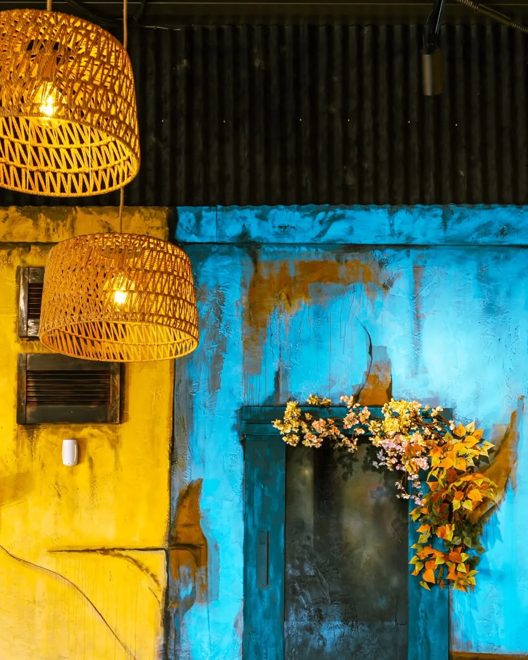 Vibrant blue and yellow interior detail at Hanoi 90s in Rolleston